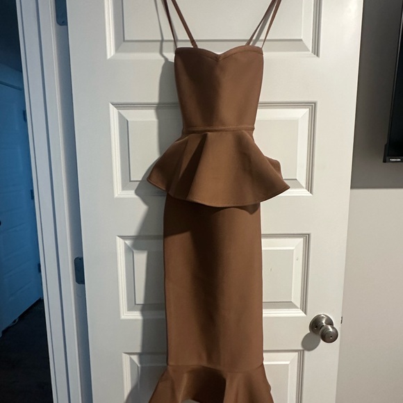 bebe Dresses & Skirts - bebe Strapless Brown Peplum Dress